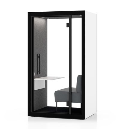 "Chatbox Solo with light grey sofa and white exterior – soundproof private pod for calls and focused work in open offices."