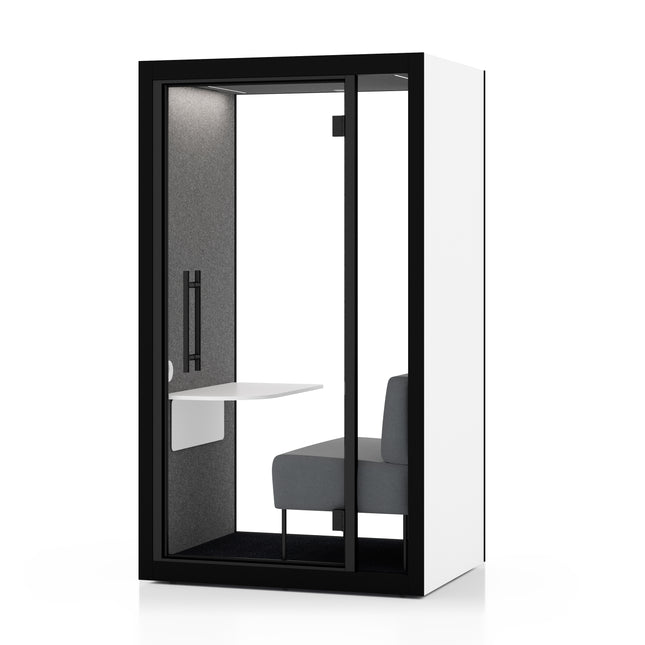 "Chatbox Solo with light grey sofa and white exterior – soundproof private pod for calls and focused work in open offices."